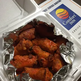 a tray of chicken wings