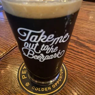 a glass of beer on a table