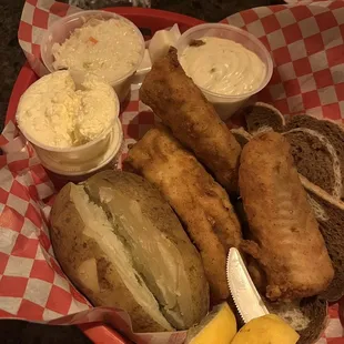 Fish and baked potato with buttah, cole slaw and tartar