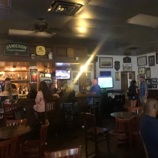 people sitting at the bar