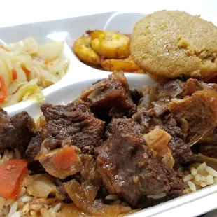 Oxtail, Jamaican cabbage, plantains, cornbread