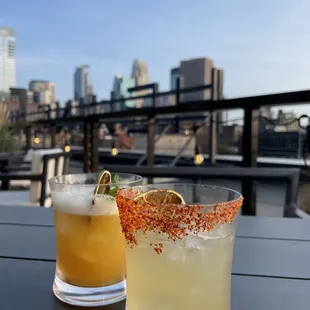 two cocktails on a table