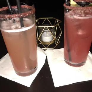 two cocktails on a table