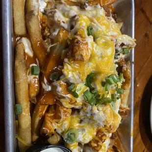 a tray of loaded fries