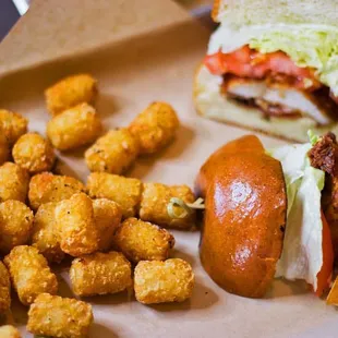 fried chicken sandwich and tater tots