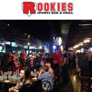 a large group of people sitting at tables
