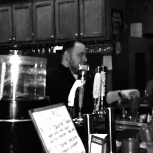 a bartender at the bar