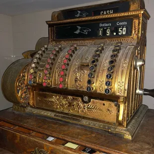 an antique cash register on display