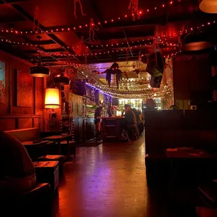 the interior of a bar with red lights