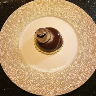 Foie Gras Crémeux, equatoriale dark chocolate, red currant pâte de fruit, sablée, caviar, edible gold