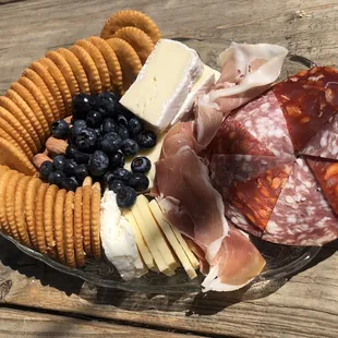 Their little charcuterie plate - smush the goat cheese &amp; blueberries on a cracker it&apos;s like blueberry cheesecake.