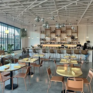 a restaurant with tables and chairs