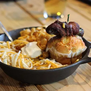 Steak House Chili with Frito&apos;s corn chips, cornbread and a jalapeno popper.