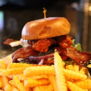 Buffalo Chicken Sandwich with fries.