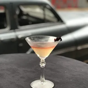 a cocktail in a martini glass