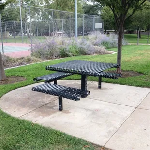 Tables line the part of the park where it meets the virginia corridor.