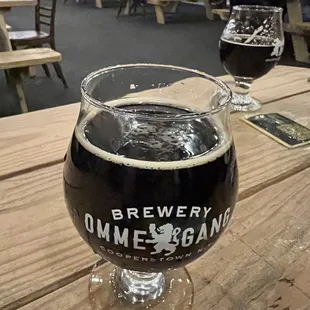 a glass of beer on a table