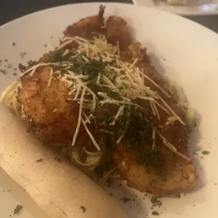 the flounder that was mush and a breadstick filled with a melted cheese stick