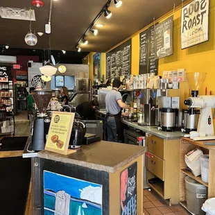 a man working in a coffee shop
