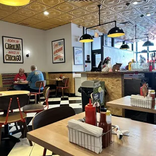 a restaurant with a checkered floor