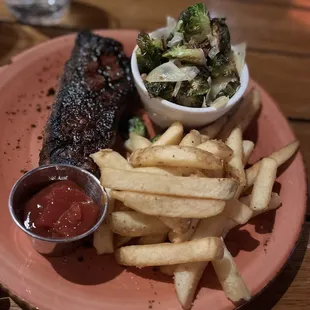 New York NY Strip Steak (12oz) Garlic Fries and Crispy Brussel Sprouts