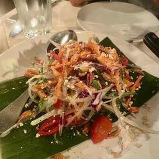 Thai green papaya salad ($13) - chili like vinaigrette  was tasty!  A little hard to eat with a fork, haha