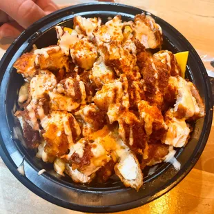 Jungle Fries- 2 tenders chopped over cheese fries topped with starz sauce