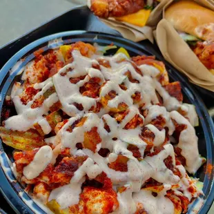 Kale-N-Rooz 
2 crispy chicken tenders chopped over kale slaw topped with pickles and our signature starz sauce