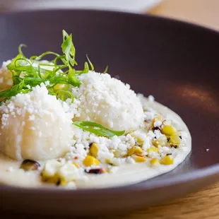 Ricotta Gnudi | Charred Cord | Cotija | Popcorn
