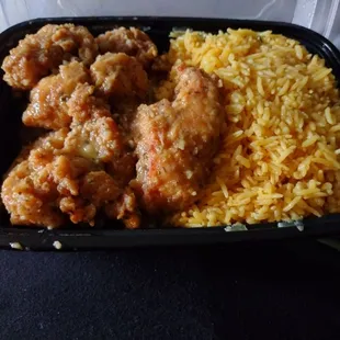 Parmesan Garlic Chicken and Rice after being smooshed by the lid.