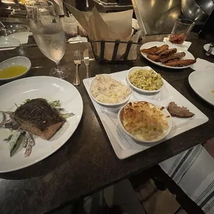 Grilled Salmon, Anson Mills Grits, Mac &amp; Cheese Pasta, Carrots, Margaux &apos;s Succotash