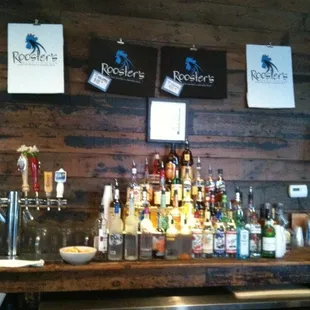 a bar with bottles of alcohol
