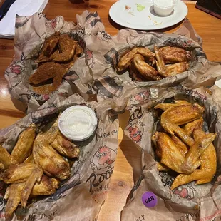 Wings - Nashville hot dry rub (Top-left), BBQ (Top-right), Garlic (bottom-left), Medium (bottom-right). All were mediocre.