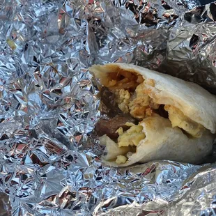 Sausage, egg and potatoes wrapped in tasty tortilla. Yum!