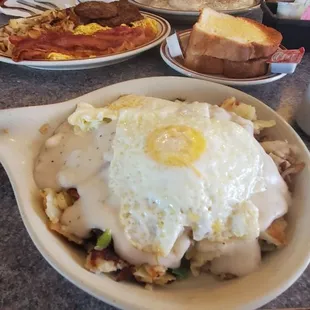Country fried steak skillet with homemade toast.