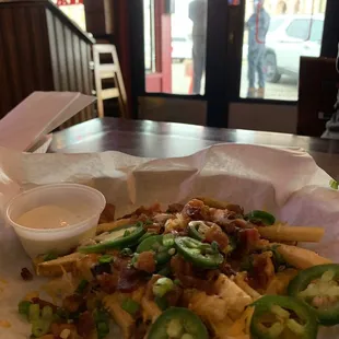 Bacon cheese fries, half-order $7.95