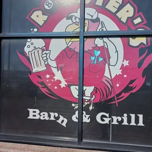 a sign for a bar and grill