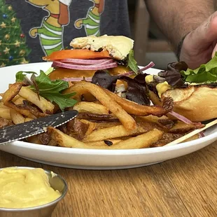 Burger with cheddar and perfect French fries. It takes a lot for him to comment on a burger and he loved this one
