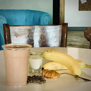 Chocolate Almond Smoothie 
Raw Cacao, Banana, Almond Butter, Almond Milk

Chocolate chips shown here because they photograph better!