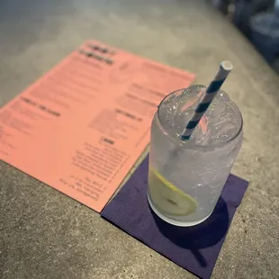 a glass of water and a drink