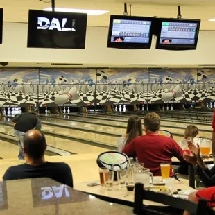 a bowling alley full of people