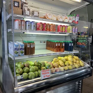 a display of fruit and juices