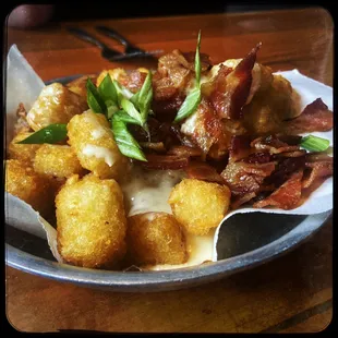 Loaded tots- notice the bar cheese so good....and so perfect as to protect the crispy integrity of those tots um... tots!