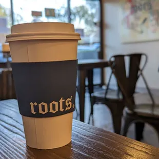 a cup of coffee on a table