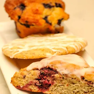 a plate of pastries and a muffin