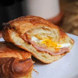 a breakfast sandwich on a plate