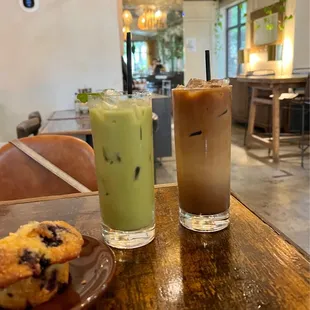 Coconut matcha + dirty chai with blueberry muffin