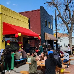 a group of people eating outside