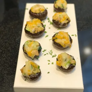 a plate of stuffed mushrooms