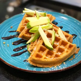 Waffles with slices of green of apple